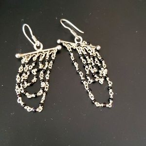 Never worn, sterling silver and black beads dangler earrings